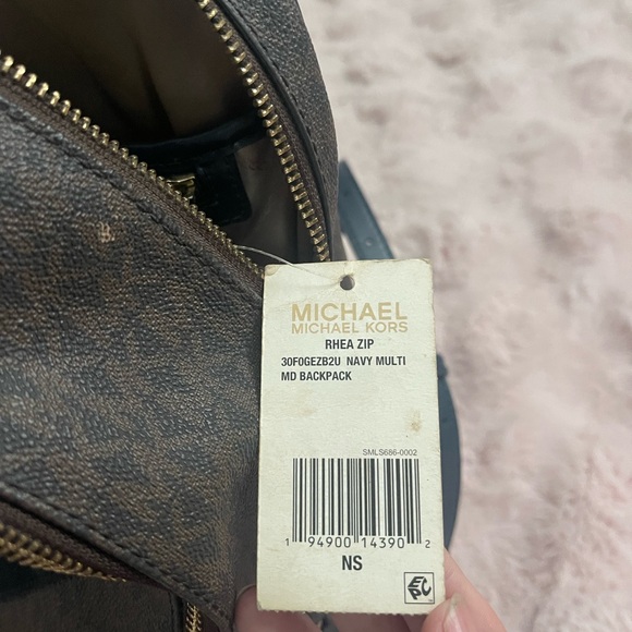 Used Michael Kors Rhea Zip backpack - Picture 16 of 17